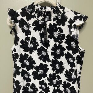 Women’s black and white blouse
